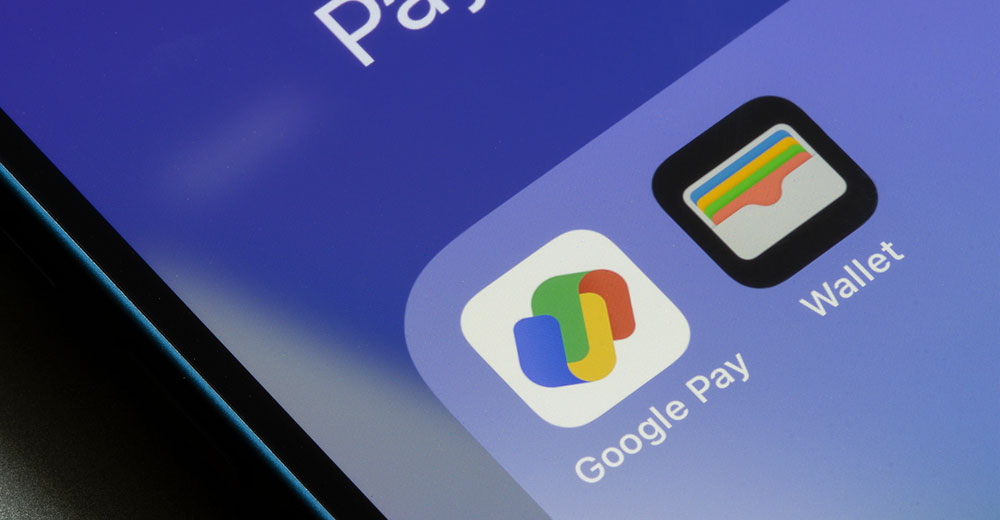 Google Pay and Apple Wallet payment apps displayed on a smartphone screen